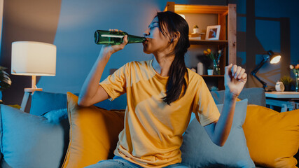 Poster - Happy young asian woman looking at camera enjoy night party event online with friends toast drink beer via video call online in living room at home, Stay at home quarantine, Social distancing concept.