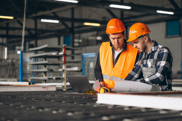 two colleagues at a factory