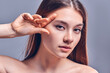 © Olena Apetroaiei - Closeup photo of beautiful lady nude naked shoulders plump shape lips tempting appearance fingers check eyebrow eye line no wrinkles face isolated grey color background