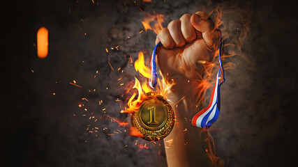 Wall Mural - woman hand raised, holding gold medal in the fire. award and victory concept