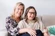 © Austockphoto - happy mother and daughter , from a series featuring a young woman with Down Syndrome