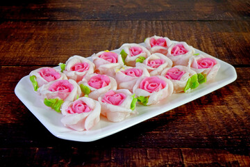 Sticker - Rose candy : Siamese Allure rose candy, famous Royal Thai cuisine. Made from coconut milk, wheat flour and sugar. Colorful roses shaped candy from Thailand, gift for Valentine's day and New year