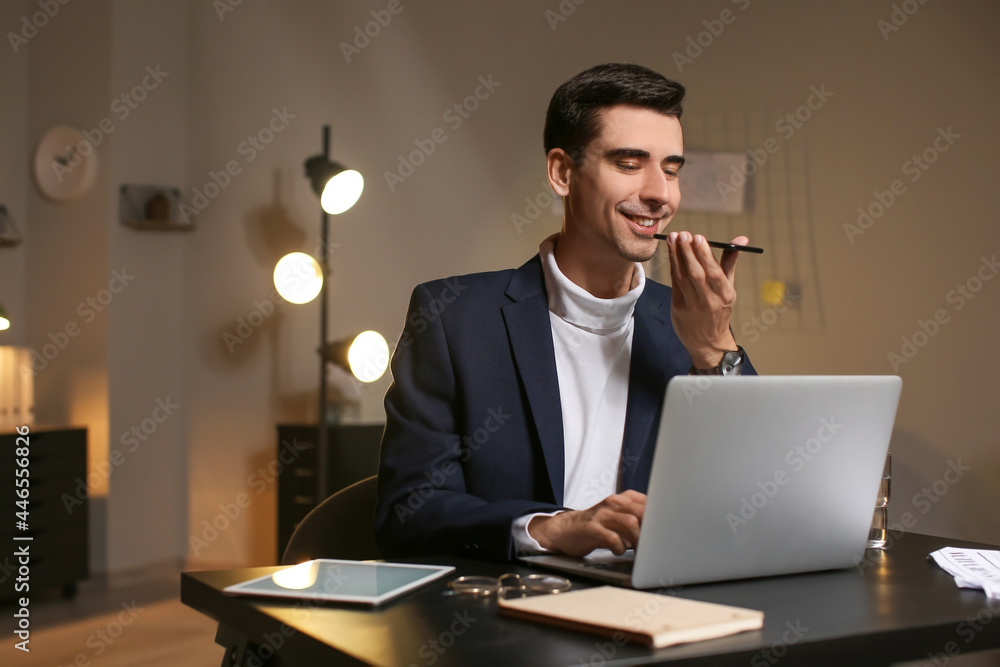 Businessman working in office late at night