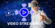 © thodonal - Man touching a video streaming concept