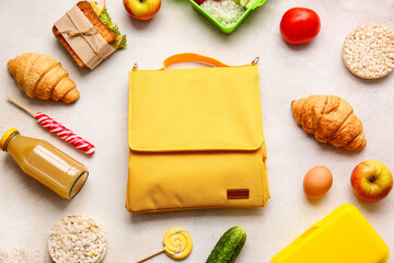 Lunch box bag and food on light background