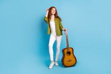 Full Length Body Size View Of Attractive Cheerful Girl Holding Guitar Posing Isolated Over Pastel Blue Color Background