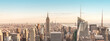 New York City Manhattan midtown aerial panorama view with skyscrapers and blue sky