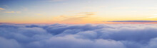 Panoramic View Above Clouds With Beautiful Sunset.
