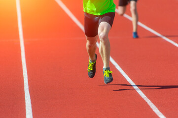 Wall Mural - Athletics people running on the track field. Professional sport concept. Horizontal sport poster, greeting cards, headers, website