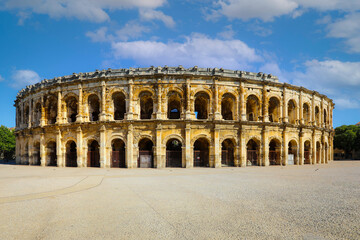 Wall Mural - Roman amphitheater in Nimes, Provence. Magnificent huge arena perfectly preserved for two thousand years