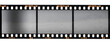 film strip, 3 blank photo frames, free space for your pictures, real 35mm film strip scan with signs of usage on white background.