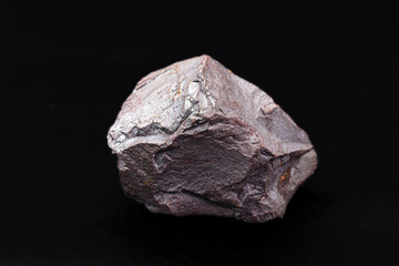Poster - Iron ore on isolated black background, metal used in metallurgical industry.