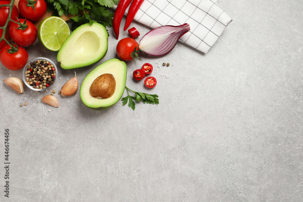 Fresh guacamole ingredients on light grey table, flat lay. Space for text - obrazy, fototapety, plakaty 