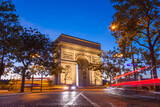 Fototapeta Paryż - Night view of Arc de Triomphe - Triumphal Arc in Paris, France