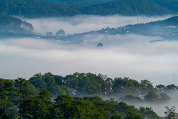 Wall Mural - the small village brighten in the foot mountains at dawn