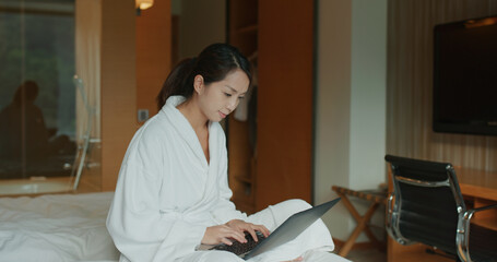 Sticker - Woman work on laptop computer at hotel room