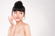© kitthanes  - Beautiful young asian woman with clean fresh skin on white background, Face care, Facial treatment, Cosmetology, beauty and spa, Asian women portrait.