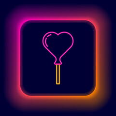 Canvas Print - Glowing neon line Balloons in form of heart with ribbon icon isolated on black background. Colorful outline concept. Vector