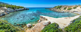 Fototapeta  - Crystal clear turquoise water in a Fokia closed bay. One of the famous places for great snorkeling. Vacation concept on Greece islands in Aegean and Mediterranean sea. Pefki. East Rhodes. Greece