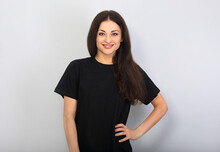 Happy Toothy Smiling Woman Posing In Blank Black T-shirt On Blue Background