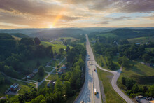 Aerial View Of Dwight D. Eisenhower Highway 70 Road Near Small Bentleyville Town In Pennsylvania, USA