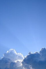 Wall Mural - Blue sky with cumulus clouds and sunlight before sunset, Nature background