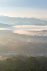 Wall Mural - the small village brighten in the foot mountains at dawn