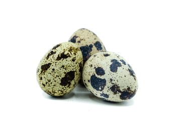 Wall Mural - Quail eggs isolated on white background