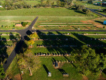 Aerial Image Of Rural Country Cemetery With Space For New Graves And Green Lawn