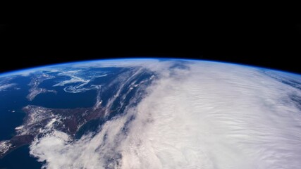 Wall Mural - Earth from space. Time lapse of over the Earth seen from the ISS. Space exploration of planet Earth at night. Elements of this video furnished by NASA.