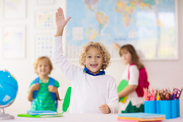 Wall Mural - Kids in school. Children in class.