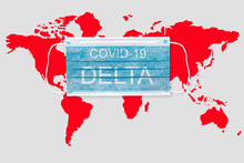 Face Mask With World Map And Inscription COVID 19 DELTA . Covid 19 Delta Variant Outbreak Around The World