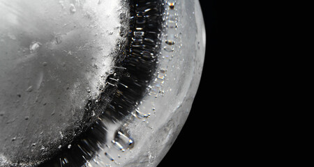 Canvas Print - macro shot of ice block texture / ice is the solid state of water.