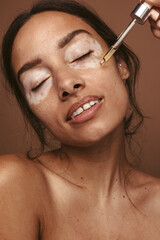 Wall Mural - woman taking treatment for skin her condition