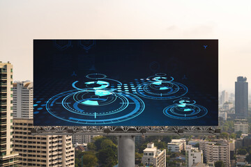 technology hologram on billboard over panorama city view of bangkok. the largest tech hub in southea