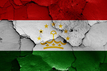 Wall Mural - flag of Tajikistan painted on cracked wall