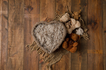 The tub has hairs on the wooden floor. for photographing newborns