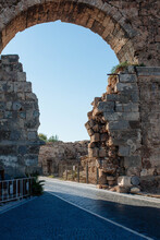 Stone Arch Of The City Of Side Turkey. Ruins Of The Ancient Greek Empire In Asia Minor