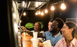 © Alessandro Biascioli - Happy multiracial people buying meal from food truck kitchen - Modern business and take away concept