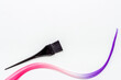 © 9dreamstudio - Brush and strand of coloring hair. Hair dye concept