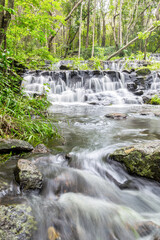 Wall Mural - Waterfall in Namtok Samlan National Park. Beautiful nature at Saraburi, Thailand.