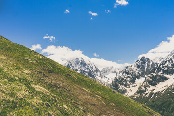 Wall Mural - Great nature mountain landscapes. Fantastic perspective of caucasian snow inactive volcano Elbrus and clearly blue sky background. Russia