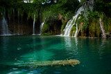 Fototapeta Góry - Beautiful splashes of water on waterfalls in Croatia national park Plitvice lakes