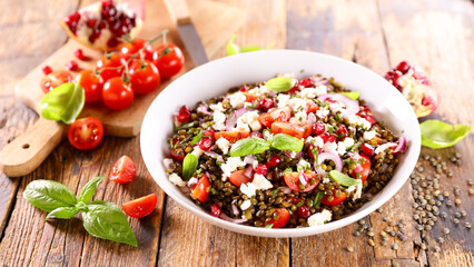 Sticker - lentil salad with tomato, cheese and pomegranate