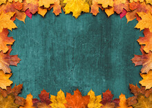 Autumn Maple Leaves On Ancient Texture. Falling Leaves Natural Background. Seasonal Background.