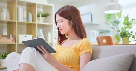 Canvas Print - woman using tablet at home