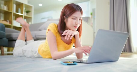 Wall Mural - Asian young woman use laptop