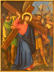 VIENNA, AUSTIRA - JUNI 17, 2021: The painting  Jesus carried his cross as part of Cross way stations in church Rochuskirche by unknown artist.