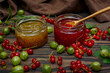Jam and red currant and gooseberry berries
