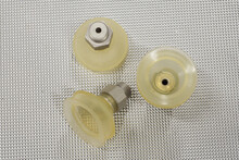 Clear industrial vacuum machine suction cups.